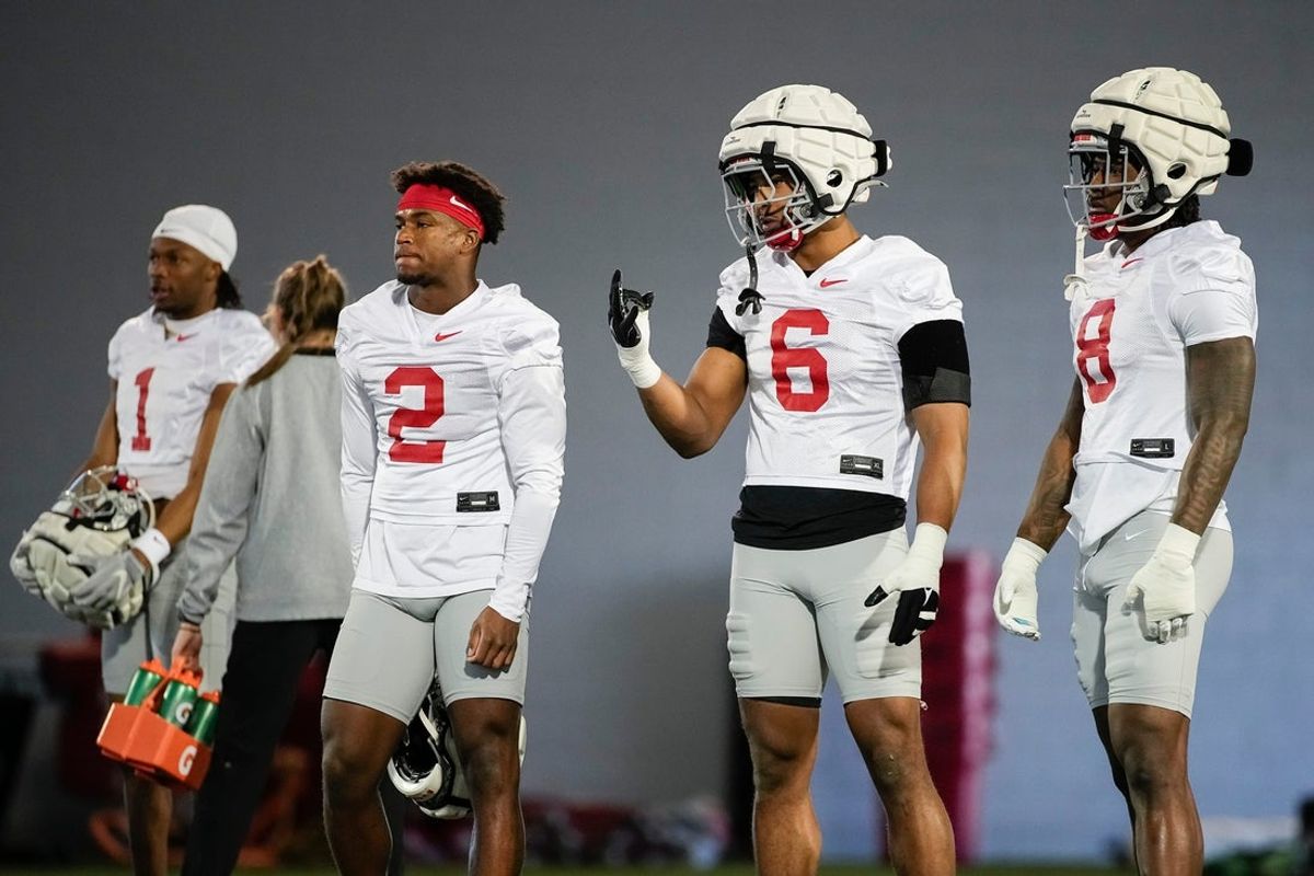 Ohio State Buckeyes linebacker Arvell Reese (8), linebacker Sonny Styles (6), safety Caleb Downs (2) and cornerback Davison Igbinosun (1) work out during spring football practice at the Woody Hayes Athletic Center on March 17, 2025.