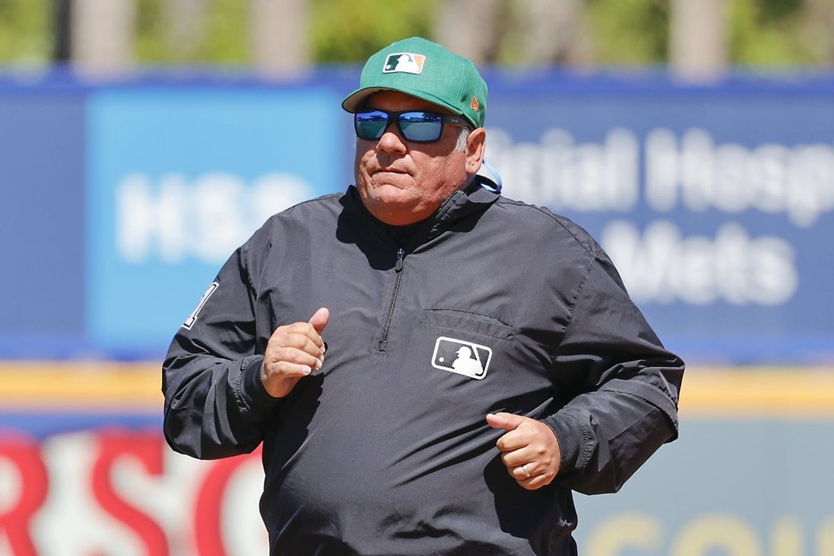 Mar 17, 2025; Port St. Lucie, Florida, USA;  Umpire Hunter Wendelstedt (21) runs to third base during the seventh inning between the New York Mets and the Tampa Bay Rays at Clover Park. Mandatory Credit: Reinhold Matay-Imagn Images