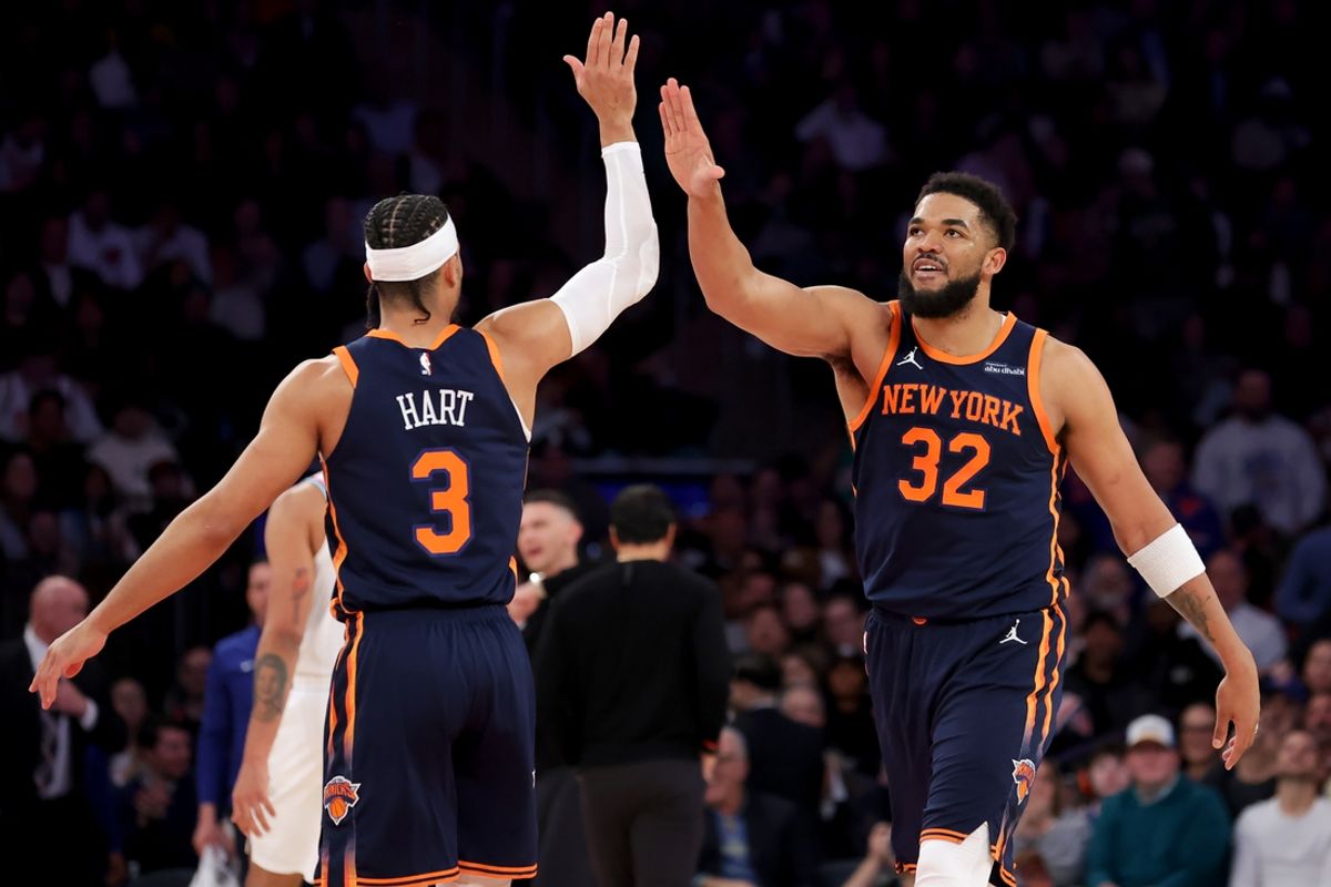 Mar 17, 2025; New York, New York, USA; New York Knicks center Karl-Anthony Towns (32) high fives guard Josh Hart (3) during the second quarter against the Miami Heat at Madison Square Garden. Mandatory Credit: Brad Penner-Imagn Images