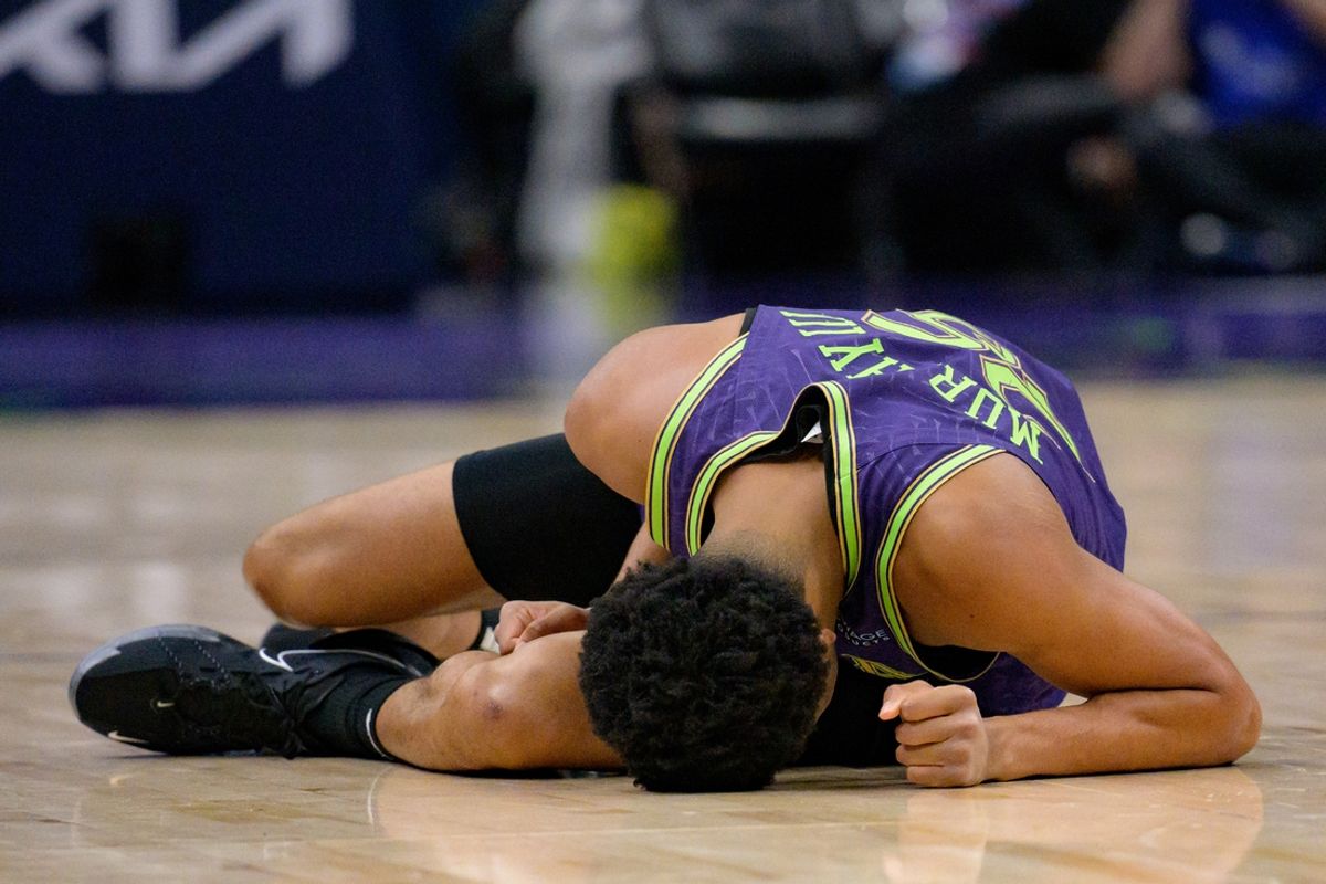 Mar 17, 2025; New Orleans, Louisiana, USA;  New Orleans Pelicans guard Trey Murphy III (25) reacts after falling after a steal by Detroit Pistons forward Ausar Thompson (9) during the first quarter at Smoothie King Center. Mandatory Credit: Matthew Hinton-Imagn Images