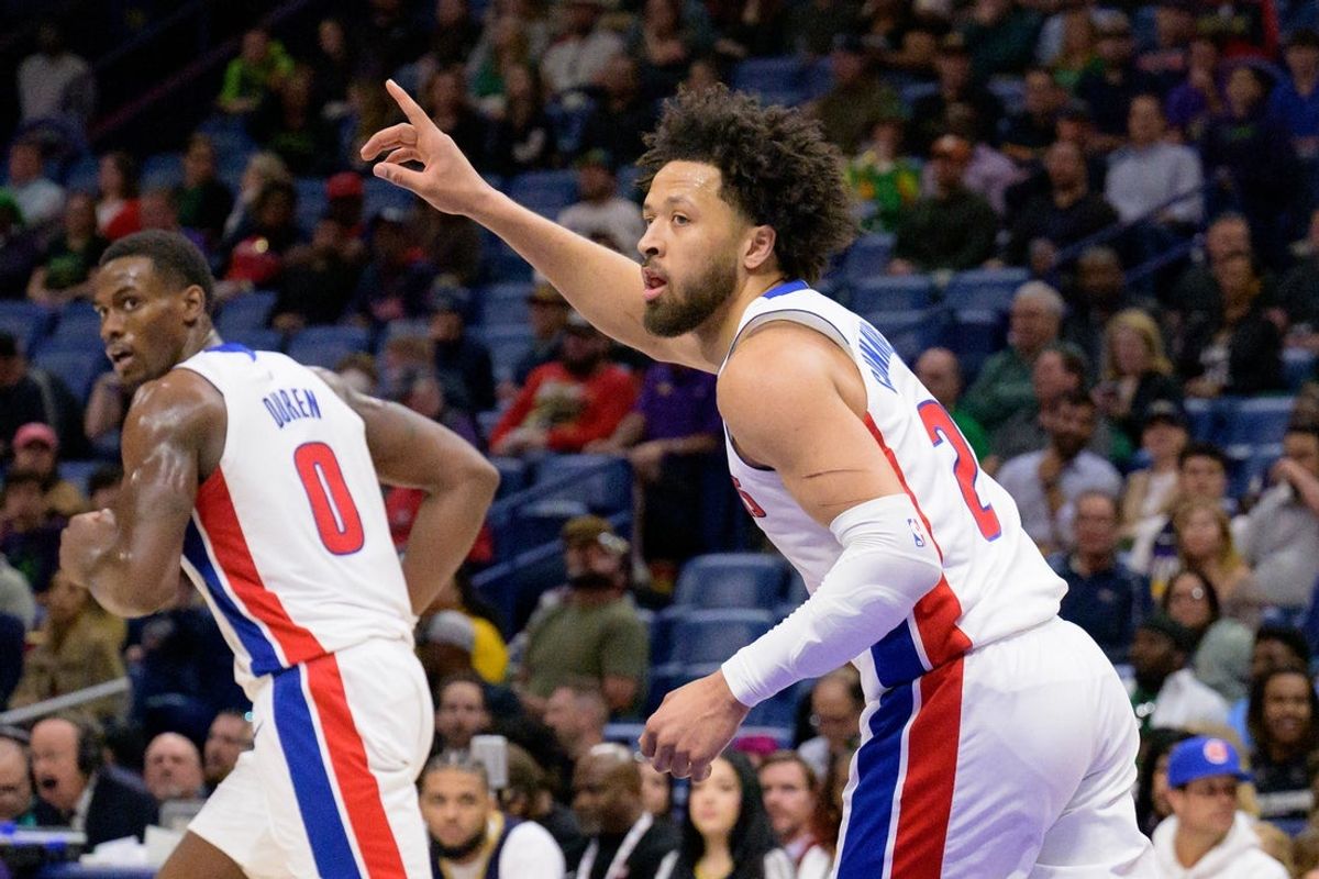 Mar 17, 2025; New Orleans, Louisiana, USA;  Detroit Pistons guard Cade Cunningham (2) reacts after a score next to center Jalen Duren (0) during the first half against the New Orleans Pelicans at Smoothie King Center. Mandatory Credit: Matthew Hinton-Imagn Images