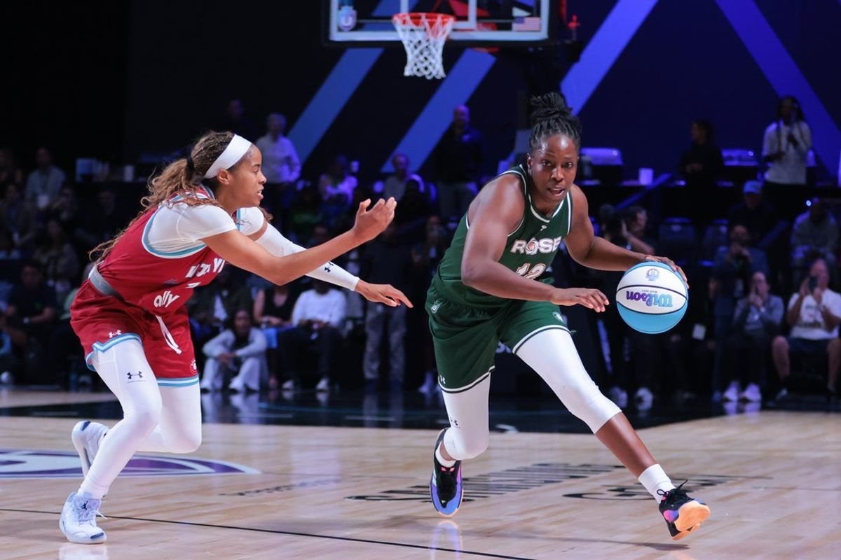 Mar 17, 2025; Miami, FL, USA; Rose BC guard Chelsea Gray (12) dribbles the basketball past Vinyl BC guard Jordin Canada (3) during the fourth quarter of the Unrivaled Championship game at Wayfair Arena. Mandatory Credit: Sam Navarro-Imagn Images