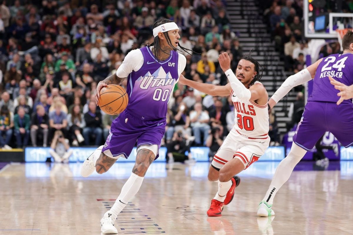 Mar 17, 2025; Salt Lake City, Utah, USA;  Utah Jazz guard Jordan Clarkson (00) brings the ball up the court during the second quarter against the Chicago Bulls at Delta Center. Mandatory Credit: Chris Nicoll-Imagn Images