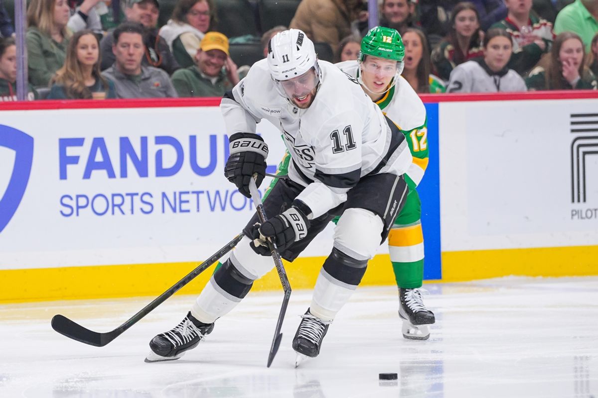 Mar 17, 2025; Saint Paul, Minnesota, USA;  Los Angeles Kings center Anze Kopitar (11) has his stick broken against the Minnesota Wild in the third period at Xcel Energy Center. Mandatory Credit: Brad Rempel-Imagn Images