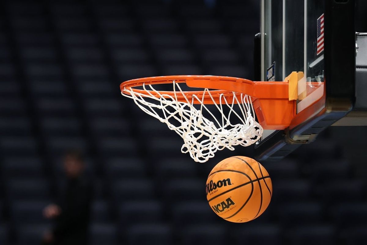 Mar 17, 2025; Dayton, OH, USA; General view as the ball enters the net during the First Four Practice at UD Arena. Mandatory Credit: Rick Osentoski-Imagn Images