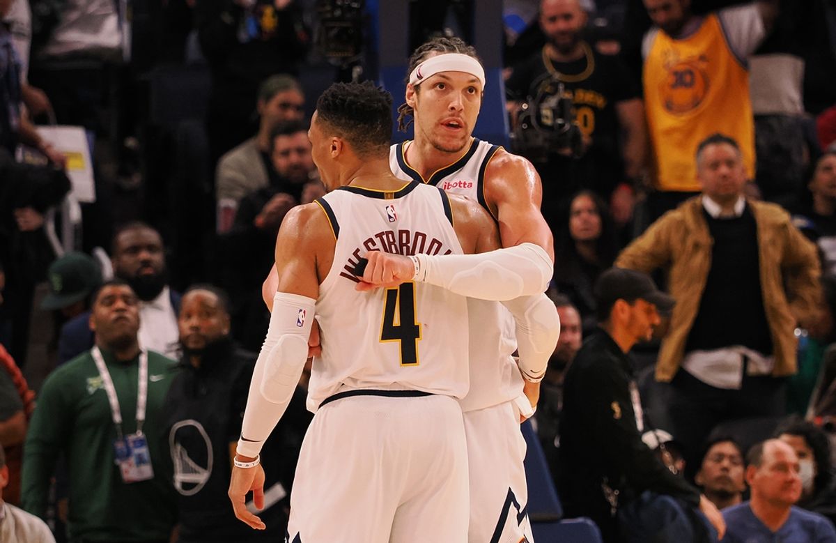 Mar 17, 2025; San Francisco, California, USA; Denver Nuggets guard Russell Westbrook (4) and forward Aaron Gordon (32) hug during the final seconds of the fourth quarter against the Golden State Warriors at Chase Center. Mandatory Credit: Kelley L Cox-Imagn Images