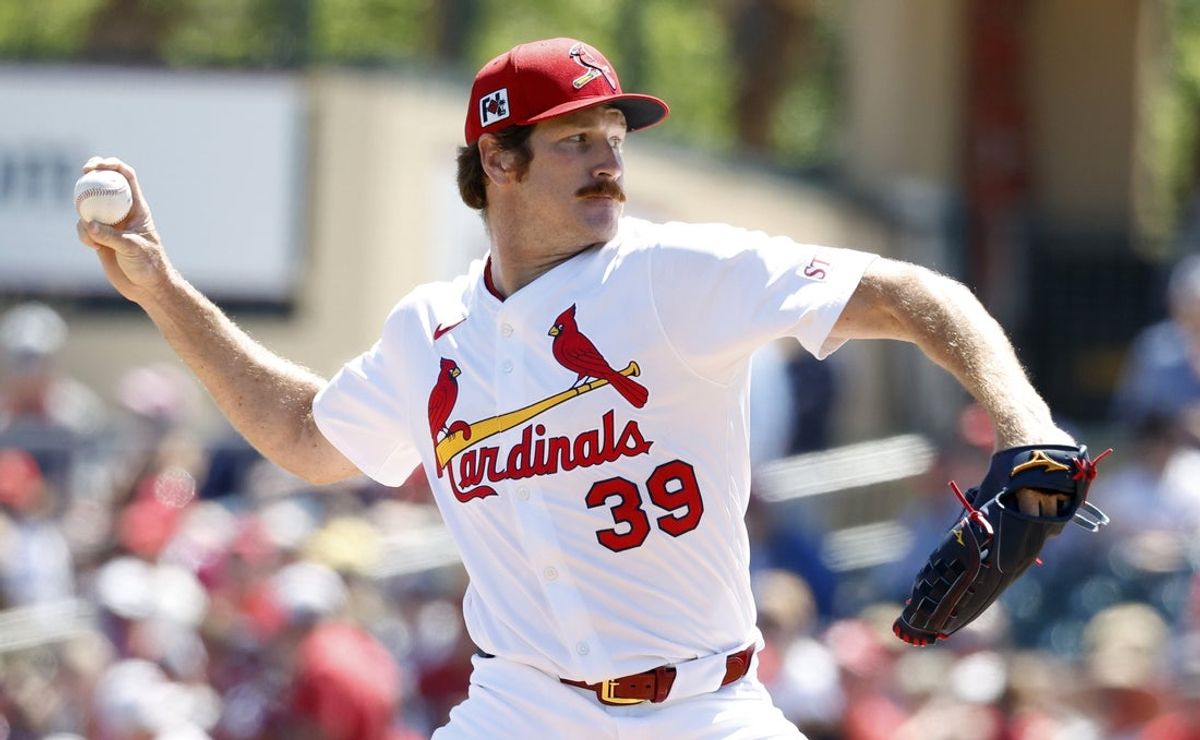 Mar 18, 2025; Jupiter, Florida, USA;  St. Louis Cardinals starting pitcher Miles Mikolas (39) pitches against the Miami Marlins during the first inning at Roger Dean Chevrolet Stadium. Mandatory Credit: Rhona Wise-Imagn Images
