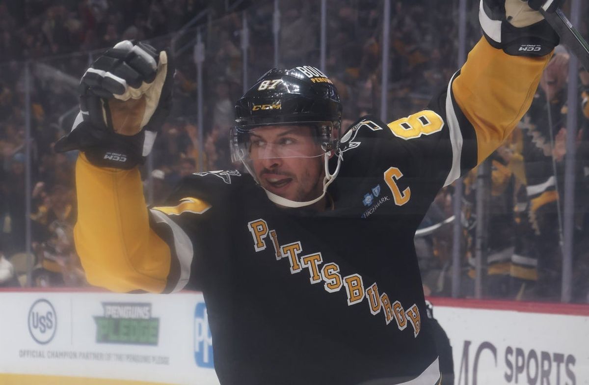 Mar 18, 2025; Pittsburgh, Pennsylvania, USA;  Pittsburgh Penguins center Sidney Crosby (87) reacts after scoring a goal against the New York Islanders during the first period at PPG Paints Arena. Mandatory Credit: Charles LeClaire-Imagn Images