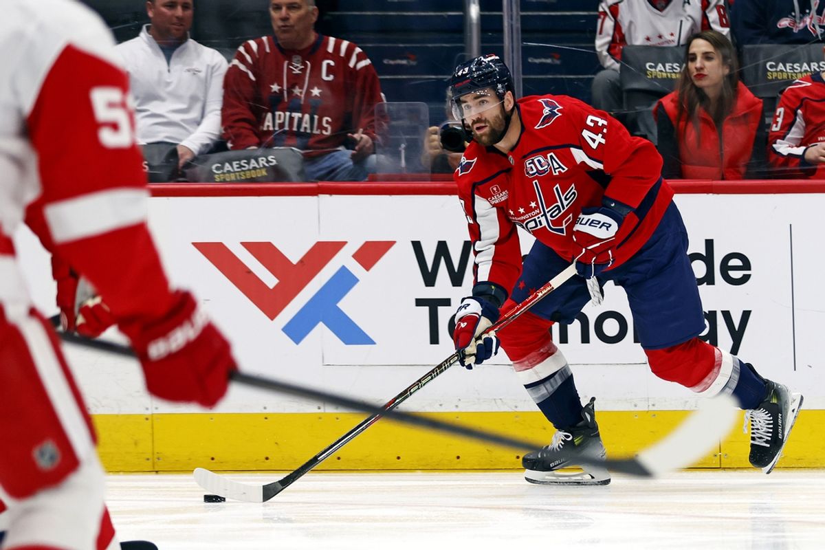 Mar 18, 2025; Washington, District of Columbia, USA; Washington Capitals right wing Tom Wilson (43) moves the puck during the first period against the Detroit Red Wings at Capital One Arena. Mandatory Credit: Peter Casey-Imagn Images