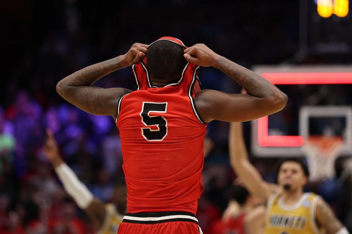 Mar 18, 2025; Dayton, OH, USA; St. Francis (Pa) Red Flash guard Daemar Kelly (5) reacts after being defeated by the Alabama State Hornets at UD Arena. Mandatory Credit: Rick Osentoski-Imagn Images
