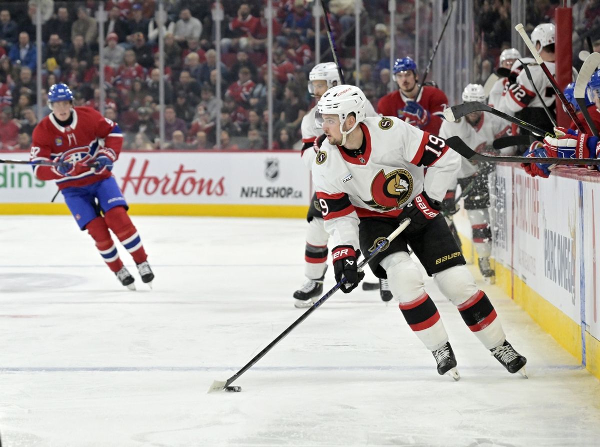 Mar 18, 2025; Montreal, Quebec, CAN; Ottawa Senators forward Drake Batherson (19) plays the puck during the second period of the game against the Montreal Canadiens at the Bell Centre. Mandatory Credit: Eric Bolte-Imagn Images
