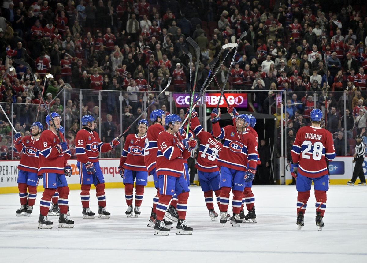 Mar 18, 2025; Montreal, Quebec, CAN; The Montreal Canadiens celebrate the win against the Ottawa Senators at the Bell Centre. Mandatory Credit: Eric Bolte-Imagn Images