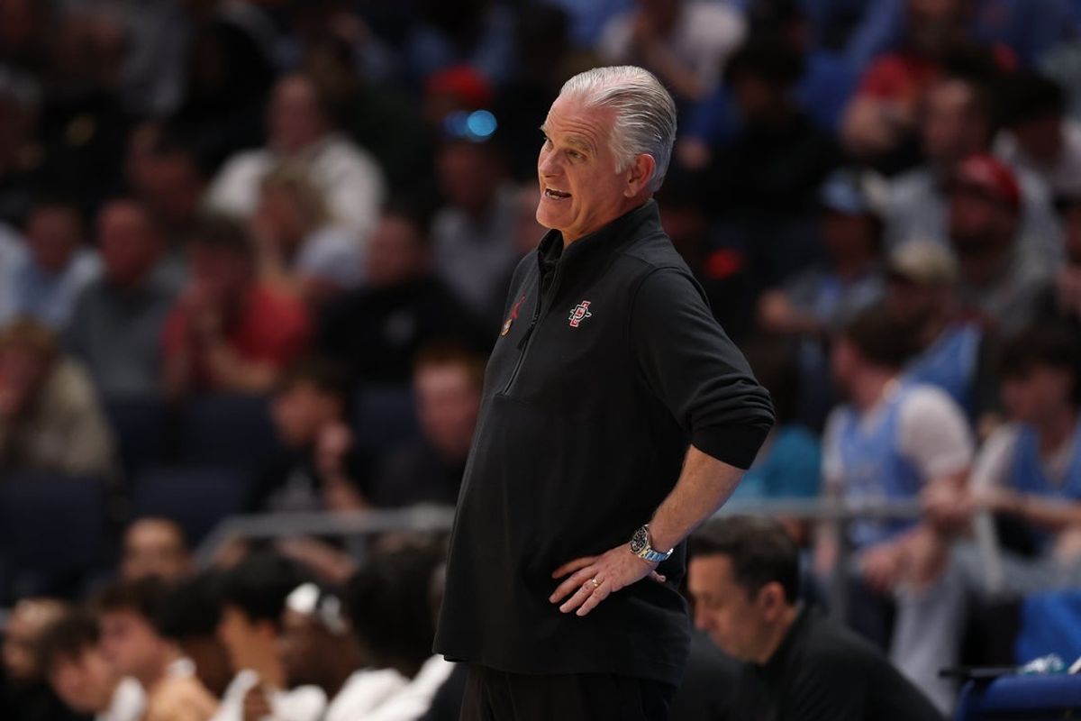 Mar 18, 2025; Dayton, OH, USA; San Diego State Aztecs head coach Brian Dutcher reacts in the first half against the North Carolina Tar Heels at UD Arena. Mandatory Credit: Rick Osentoski-Imagn Images