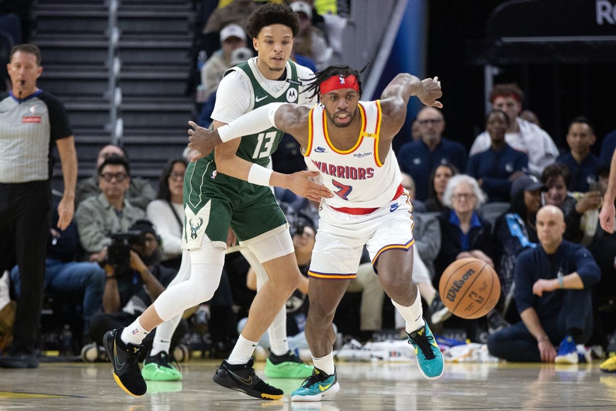 Mar 18, 2025; San Francisco, California, USA; Golden State Warriors guard Buddy Hield (7) pursues a loose ball after Milwaukee Bucks guard Ryan Rollins (13) knocked it out of his hands during the second quarter at Chase Center. Mandatory Credit: D. Ross Cameron-Imagn Images