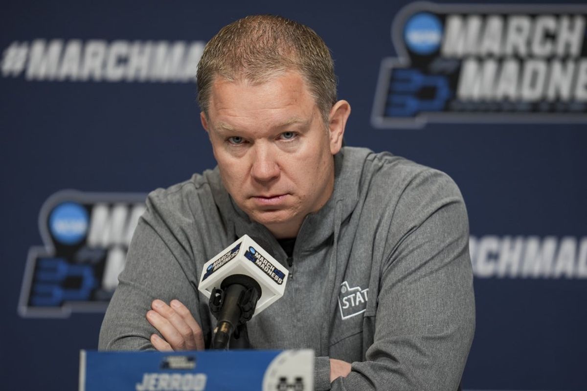 Mar 19, 2025; Lexington, KY, USA;  Utah State head coach Jerrod Calhoun talks with media during NCAA Tournament First Round Practice at Rupp Arena. Mandatory Credit: Aaron Doster-Imagn Images