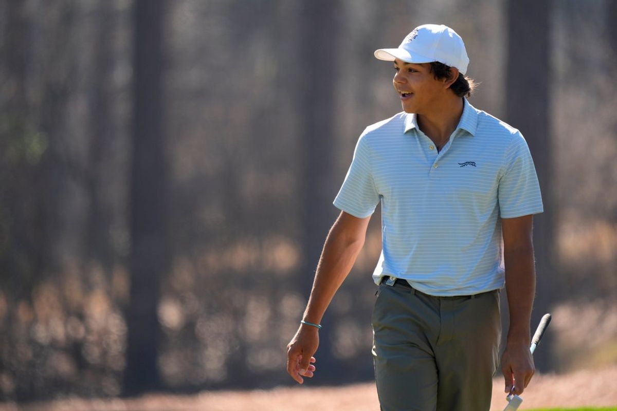 Mar 19, 2025; Graniteville, South Carolina, USA; Charlie Woods reacts to his putt on No. one green during the first round of the Junior Invitational at Sage Valley Golf Club. Woods is the son of golf legend Tiger Woods and finished at +6. Mandatory Credit: Katie Goodale - Augusta Chronicle/USA TODAY NETWORK