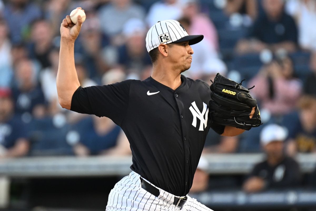 Mar 19, 2025; Tampa, Florida, USA; New York Yankees starting pitcher Carlos Carrasco (59) throws a pitch in the first inning against the Atlanta Braves during spring training at George M. Steinbrenner Field. Mandatory Credit: Jonathan Dyer-Imagn Images