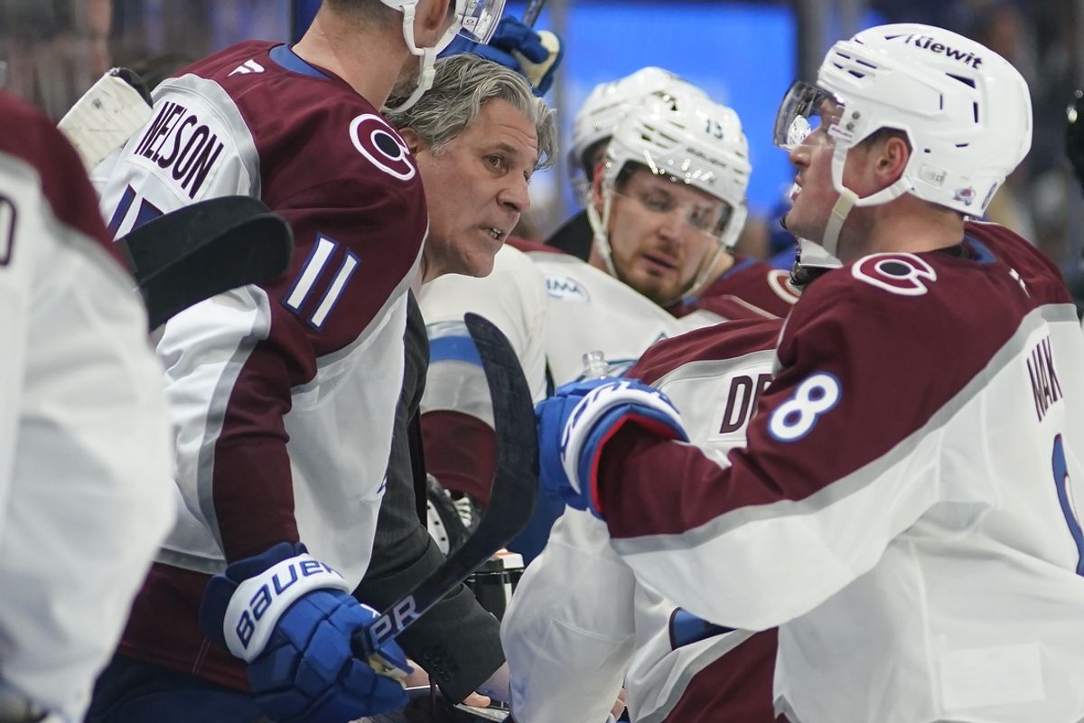 Mar 19, 2025; Toronto, Ontario, CAN; Colorado Avalanche head coach Jared Bednar (center) talks to his late during the third period against the Toronto Maple Leafs at Scotiabank Arena. Mandatory Credit: John E. Sokolowski-Imagn Images