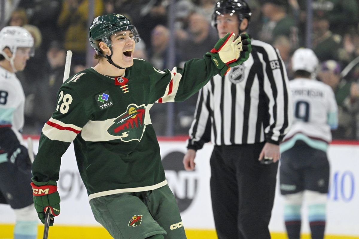 Mar 19, 2025; Saint Paul, Minnesota, USA;  Minnesota Wild forward Liam Ohgren (28) celebrates his goal against the Seattle Kraken during the first period at Xcel Energy Center. Mandatory Credit: Nick Wosika-Imagn Images