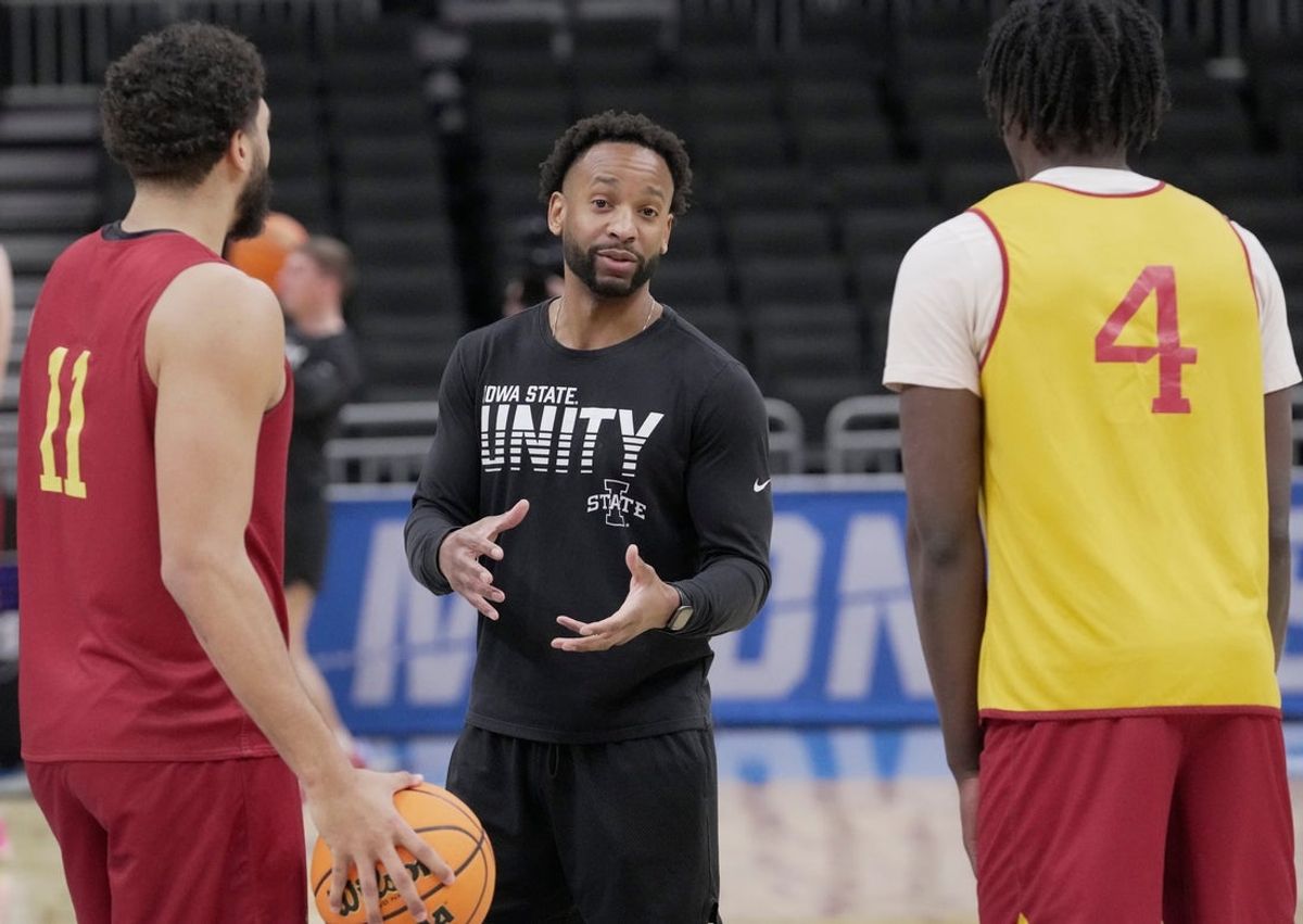 Iowa State assistant coach JR Blount, center, is shown during practice before their first round NCAA men’ s basketball tournament game Thursday, March 20, 2025 at Fiserv Forum in Milwaukee, Wisconsin. He went to school at Dominican High School in Whitefish Bay, Wisconsin.