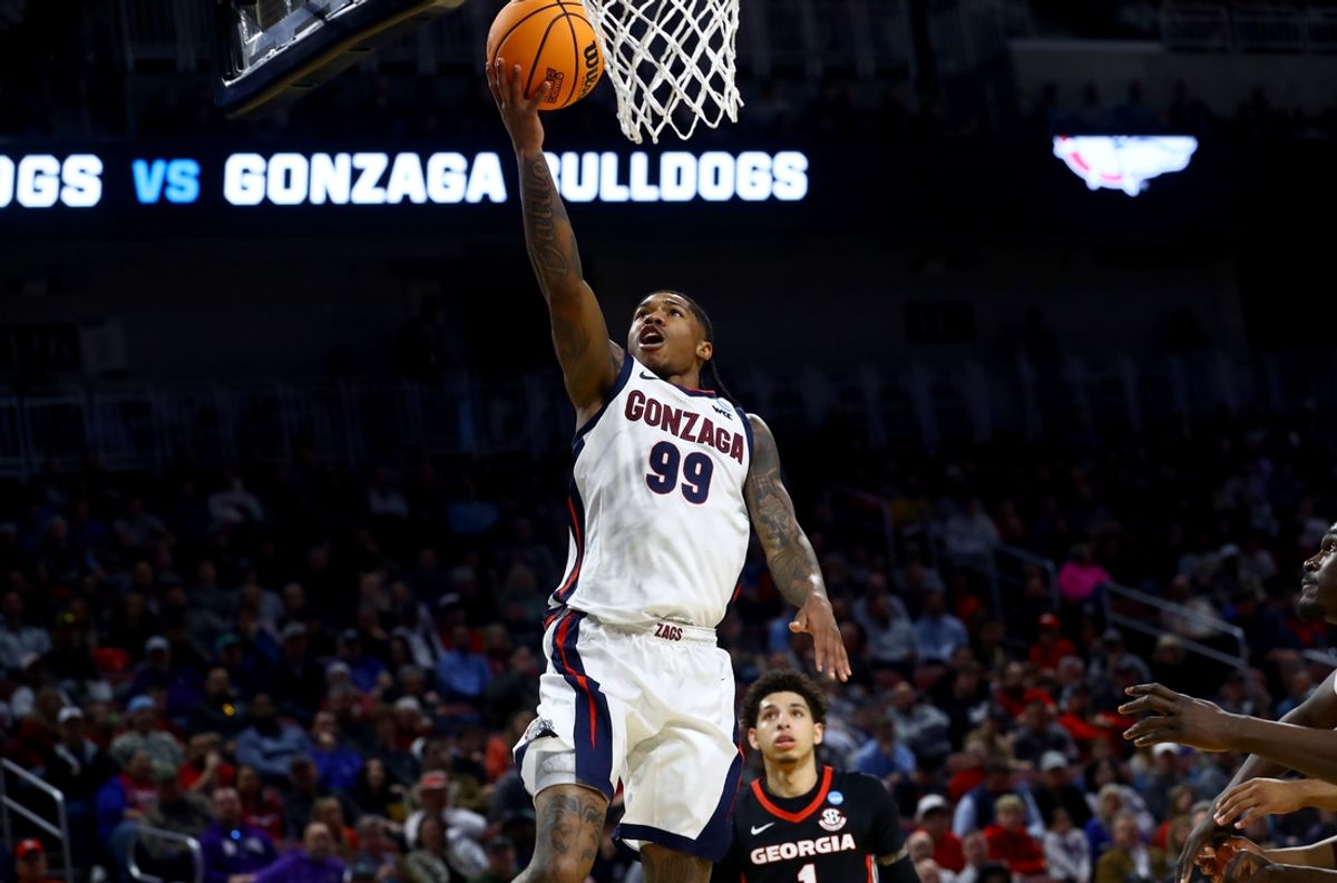 Mar 20, 2025; Wichita, KS, USA; Gonzaga Bulldogs guard Khalif Battle (99) shoots in the first half of a first round men’s NCAA Tournament game against the Georgia Bulldogs at Intrust Bank Arena. Mandatory Credit: Nick Tre. Smith-Imagn Images