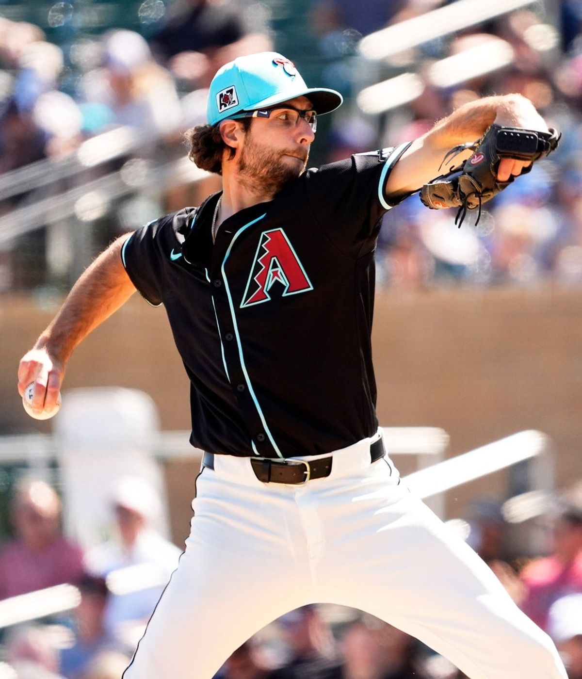 Arizona Diamondbacks starting pitcher Zac Gallen throws to the Athletics in the second inning during a spring training game at Salt River Fields in Scottsdale on March 20, 2025.