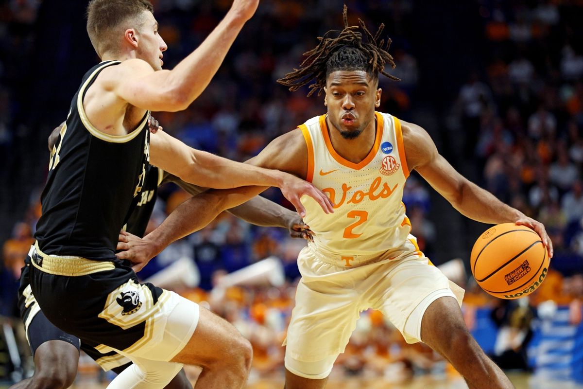 Mar 20, 2025; Lexington, KY, USA; Tennessee Volunteers guard Chaz Lanier (2) drives to the basket against Wofford Terriers forward Jeremy Lorenz (32) during the first half in the first round of the NCAA Tournament at Rupp Arena. Mandatory Credit: Jordan Prather-Imagn Images