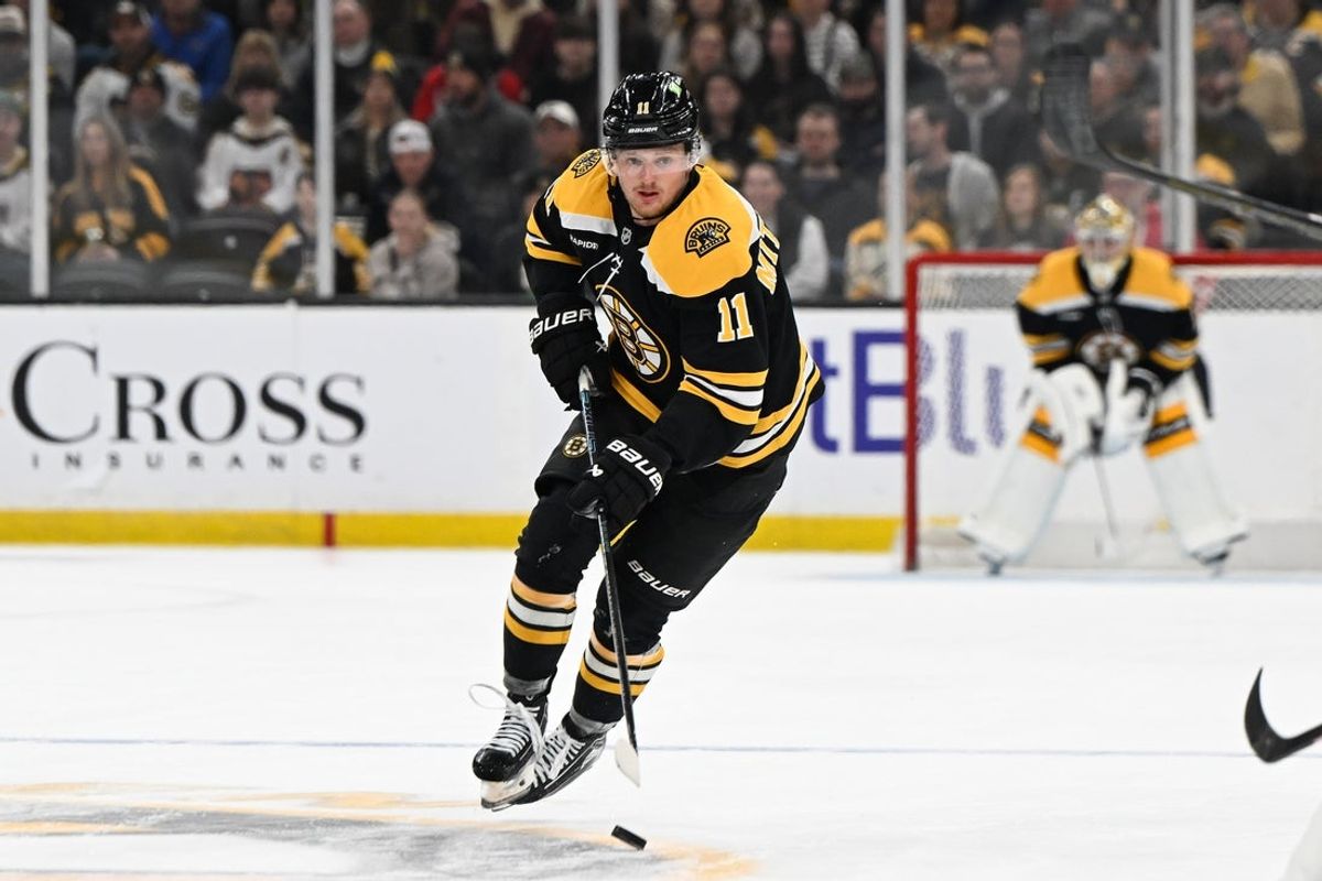 Mar 15, 2025; Boston, Massachusetts, USA; Boston Bruins center Casey Mittelstadt (11) skates against the Tampa Bay Lightning during the first period at TD Garden. Mandatory Credit: Eric Canha-Imagn Images