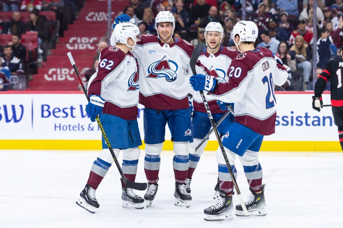Mar 20, 2025; Ottawa, Ontario, CAN; Colorado Avalanche center Brock Nelson (11) celebrates with left wing Artturi Lehkonen (62) centermen Charlie Coyle (10) and Ross Colton (20) in the second period against the Ottawa Senators at the Canadian Tire Centre. Mandatory Credit: Marc DesRosiers-Imagn Images