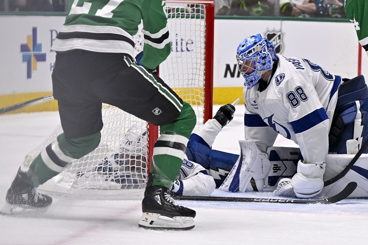 Mar 20, 2025; Dallas, Texas, USA; Tampa Bay Lightning goaltender Andrei Vasilevskiy (88) and defenseman Emil Lilleberg (78) give up a power play goal to Dallas Stars left wing Mason Marchment (27) during the second period at the American Airlines Center. Mandatory Credit: Jerome Miron-Imagn Images