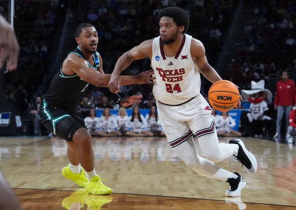 Mar 20, 2025; Wichita, KS, USA; Texas Tech Red Raiders guard Kerwin Walton (24) drives against North Carolina-Wilmington Seahawks guard Donovan Newby (1) in the first half of a first round men’s NCAA Tournament game at Intrust Bank Arena. Mandatory Credit: Kirby Lee-Imagn Images
