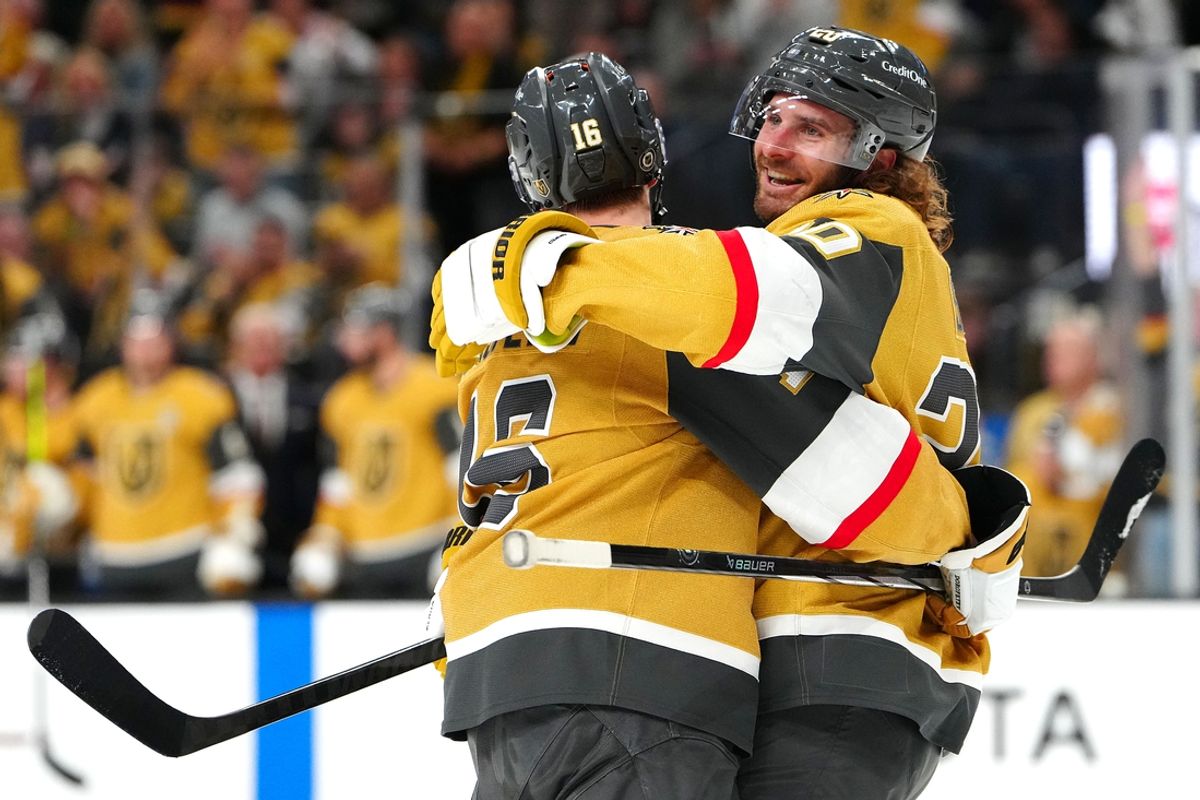 Mar 20, 2025; Las Vegas, Nevada, USA; Vegas Golden Knights left wing Pavel Dorofeyev (16) celebrates with Vegas Golden Knights left wing Brandon Saad (20) after scoring a goal against the Boston Bruins during the second period at T-Mobile Arena. Mandatory Credit: Stephen R. Sylvanie-Imagn Images