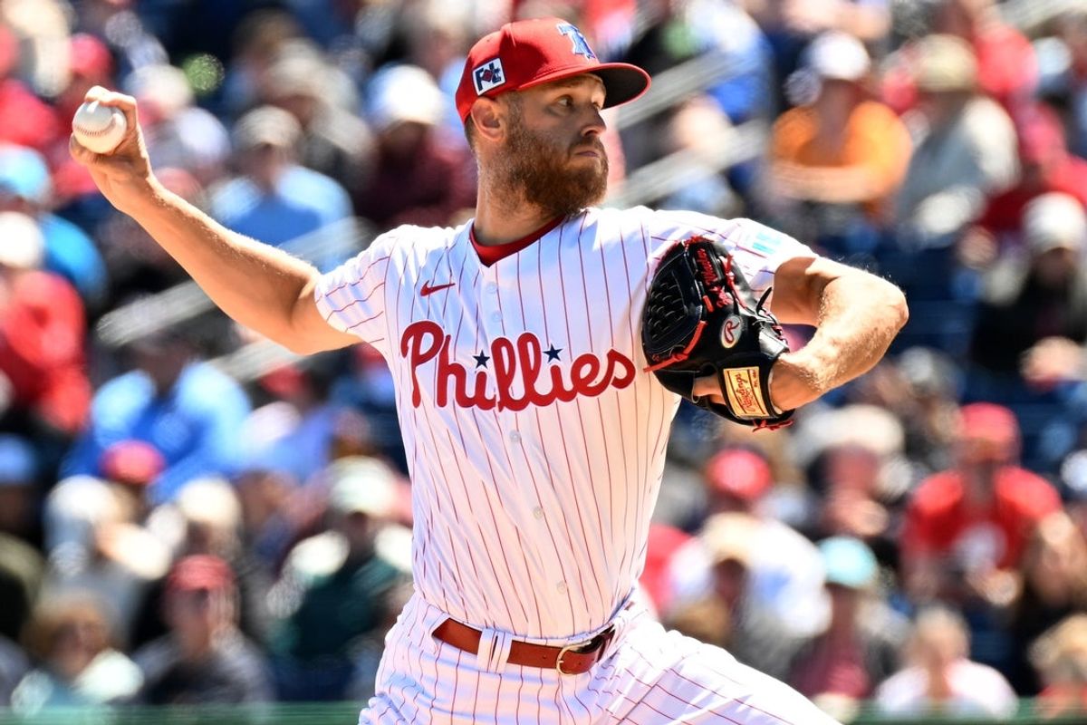 Mar 21, 2025; Clearwater, Florida, USA; Philadelphia Phillies starting pitcher Zach Wheeler (45) throws a pitch in the first inning against the Minnesota Twins during spring training  at BayCare Ballpark. Mandatory Credit: Jonathan Dyer-Imagn Images