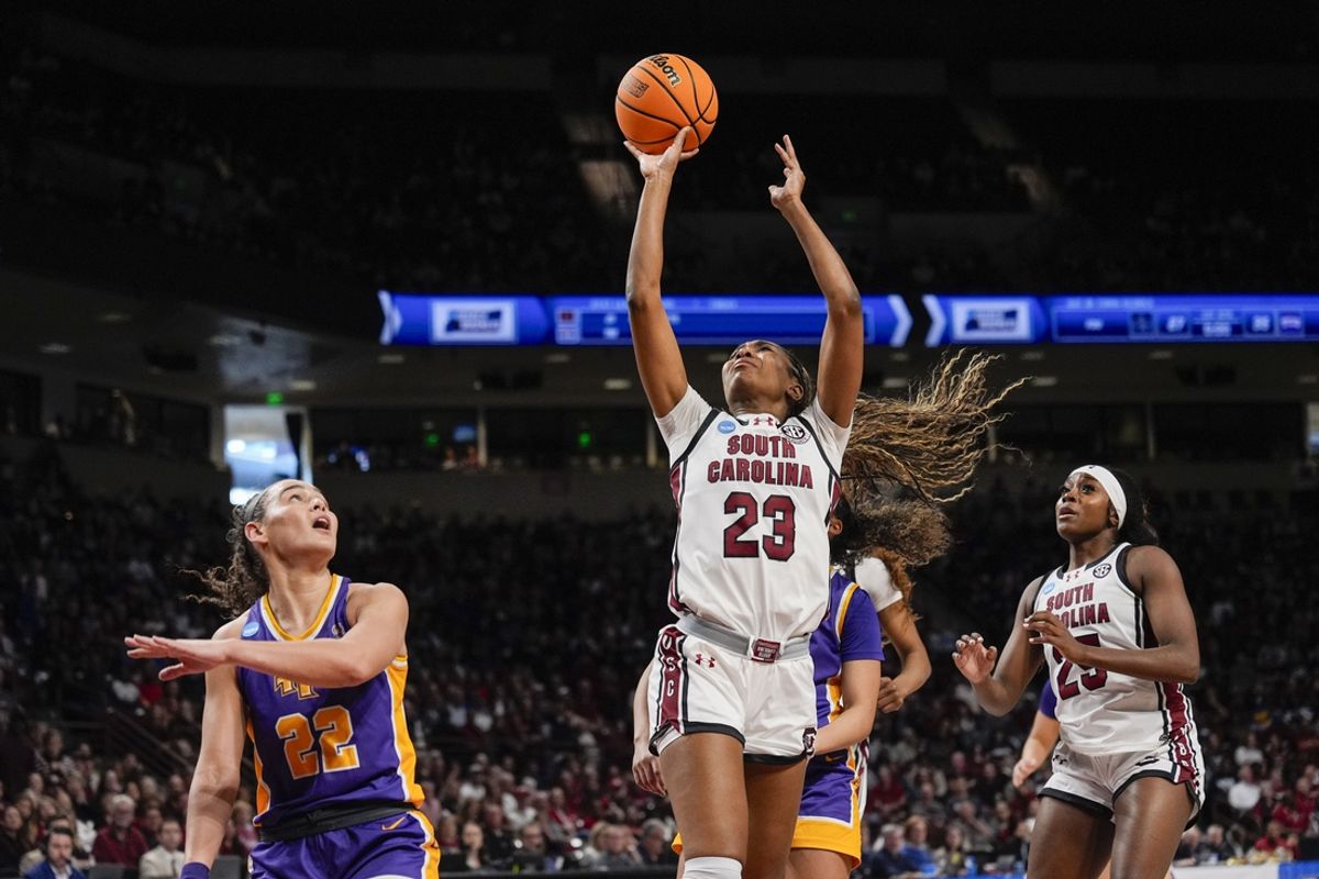 Mar 21, 2025; Columbia, South Carolina, USA; South Carolina Gamecocks guard Bree Hall (23) shoots against the Tennessee Tech Golden Eagles during the first half  at Colonial Life Arena. Mandatory Credit: Jim Dedmon-Imagn Images