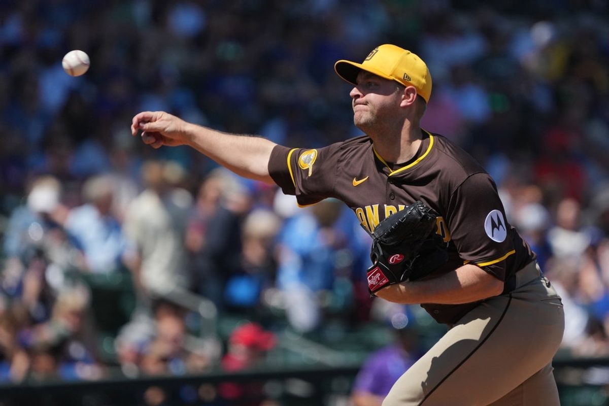 Mar 21, 2025; Mesa, Arizona, USA; San Diego Padres pitcher Michael King (34) throws against the Chicago Cubs in the first inning at Sloan Park. Mandatory Credit: Rick Scuteri-Imagn Images