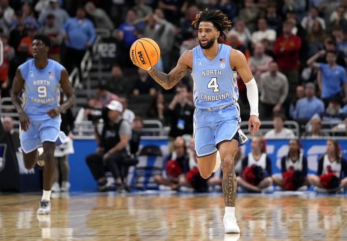 Mar 21, 2025; Milwaukee, WI, USA; North Carolina Tar Heels guard RJ Davis (4) dribbles during the second half of a first round NCAA men’s tournament game against the Mississippi Rebels at Fiserv Forum. Mandatory Credit: Jeff Hanisch-Imagn Images