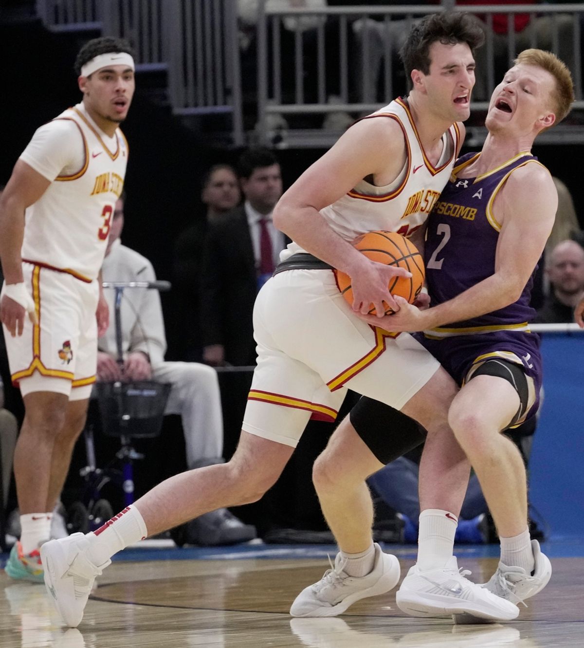 Iowa State forward Milan Momcilovic (22) is fouled by Lipscomb guard Will Pruitt (2) during the first half of their first round NCAA men’ s basketball tournament game Friday, March 21, 2025 at Fiserv Forum in Milwaukee, Wisconsin.