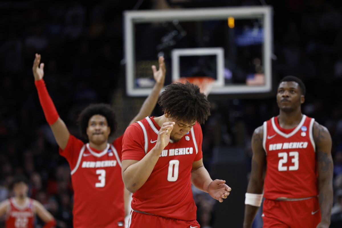 Mar 21, 2025; Cleveland, OH, USA; New Mexico Lobos guard CJ Noland (0) celebrates after defeating the Marquette Golden Eagles during the NCAA Tournament First Round at Rocket Arena. Mandatory Credit: Rick Osentoski-Imagn Images