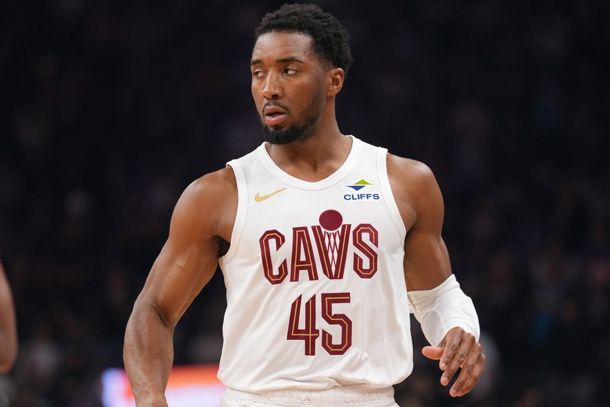 Mar 21, 2025; Phoenix, Arizona, USA; Cleveland Cavaliers guard Donovan Mitchell (45) looks on against the Phoenix Suns during the first half at Footprint Center. Mandatory Credit: Joe Camporeale-Imagn Images