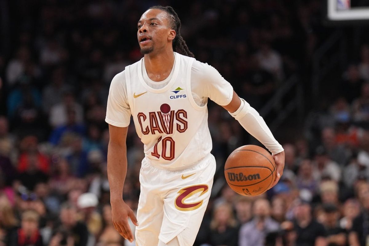 Mar 21, 2025; Phoenix, Arizona, USA; Cleveland Cavaliers guard Darius Garland (10) dribbles against the Phoenix Suns during the first half at Footprint Center. Mandatory Credit: Joe Camporeale-Imagn Images