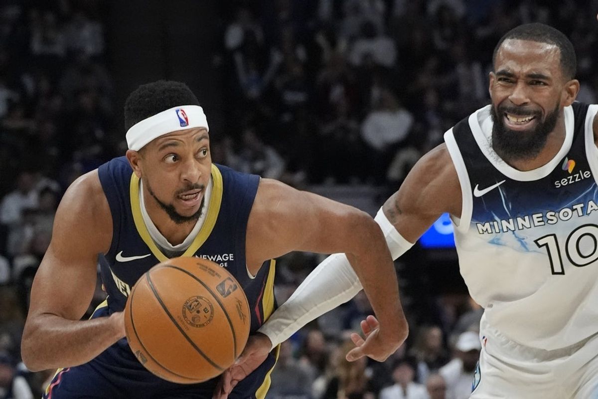 Mar 21, 2025; Minneapolis, Minnesota, USA; New Orleans Pelicans guard CJ McCollum (3) works around Minnesota Timberwolves guard Mike Conley (10) in the third quarter at Target Center. Mandatory Credit: Bruce Kluckhohn-Imagn Images