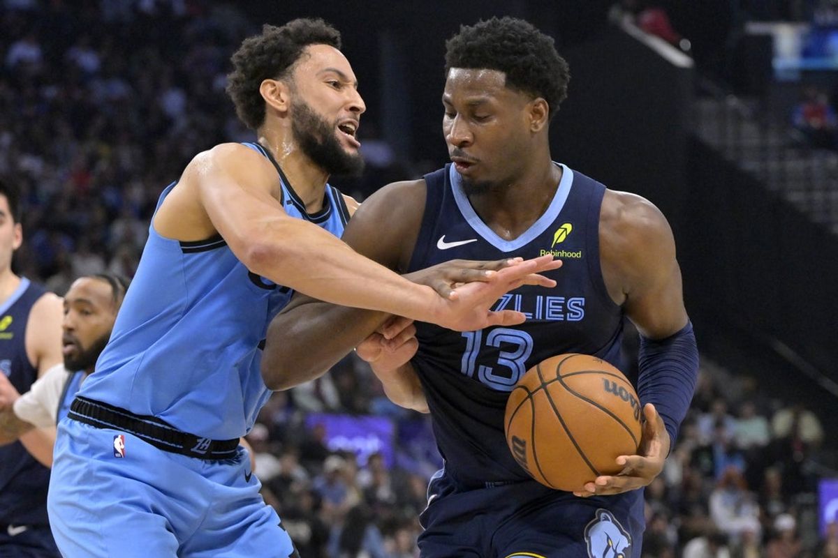 Mar 21, 2025; Inglewood, California, USA;  Los Angeles Clippers guard Ben Simmons (25) steals the ball from Memphis Grizzlies forward Jaren Jackson Jr. (13) in the first half at Intuit Dome. Mandatory Credit: Jayne Kamin-Oncea-Imagn Images