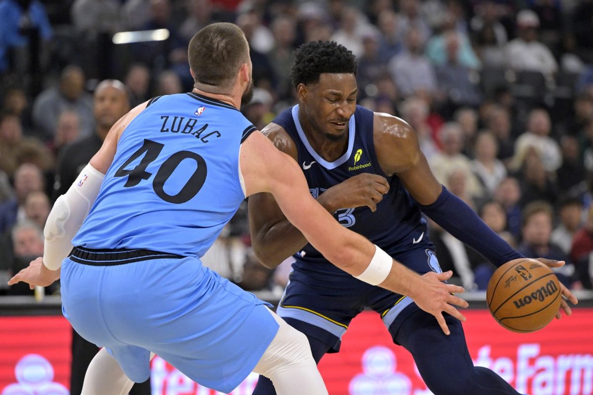 Mar 21, 2025; Inglewood, California, USA;  Memphis Grizzlies forward Jaren Jackson Jr. (13) drives past Los Angeles Clippers center Ivica Zubac (40) in the first half at Intuit Dome. Mandatory Credit: Jayne Kamin-Oncea-Imagn Images