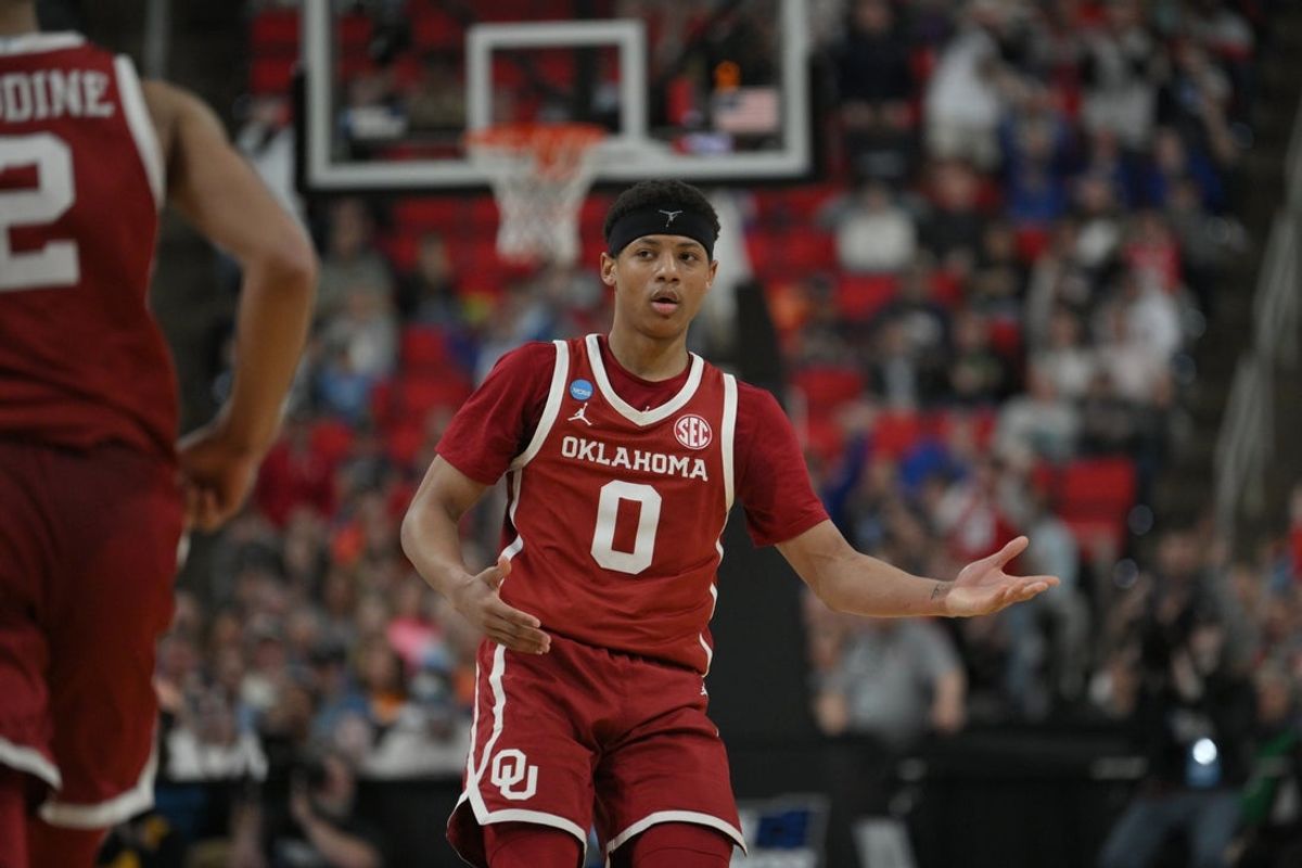 Mar 21, 2025; Raleigh, NC, USA;  Oklahoma Sooners guard Jeremiah Fears (0) reacts after scoring against Connecticut Huskies during the second half at Lenovo Center. Mandatory Credit: Zachary Taft-Imagn Images