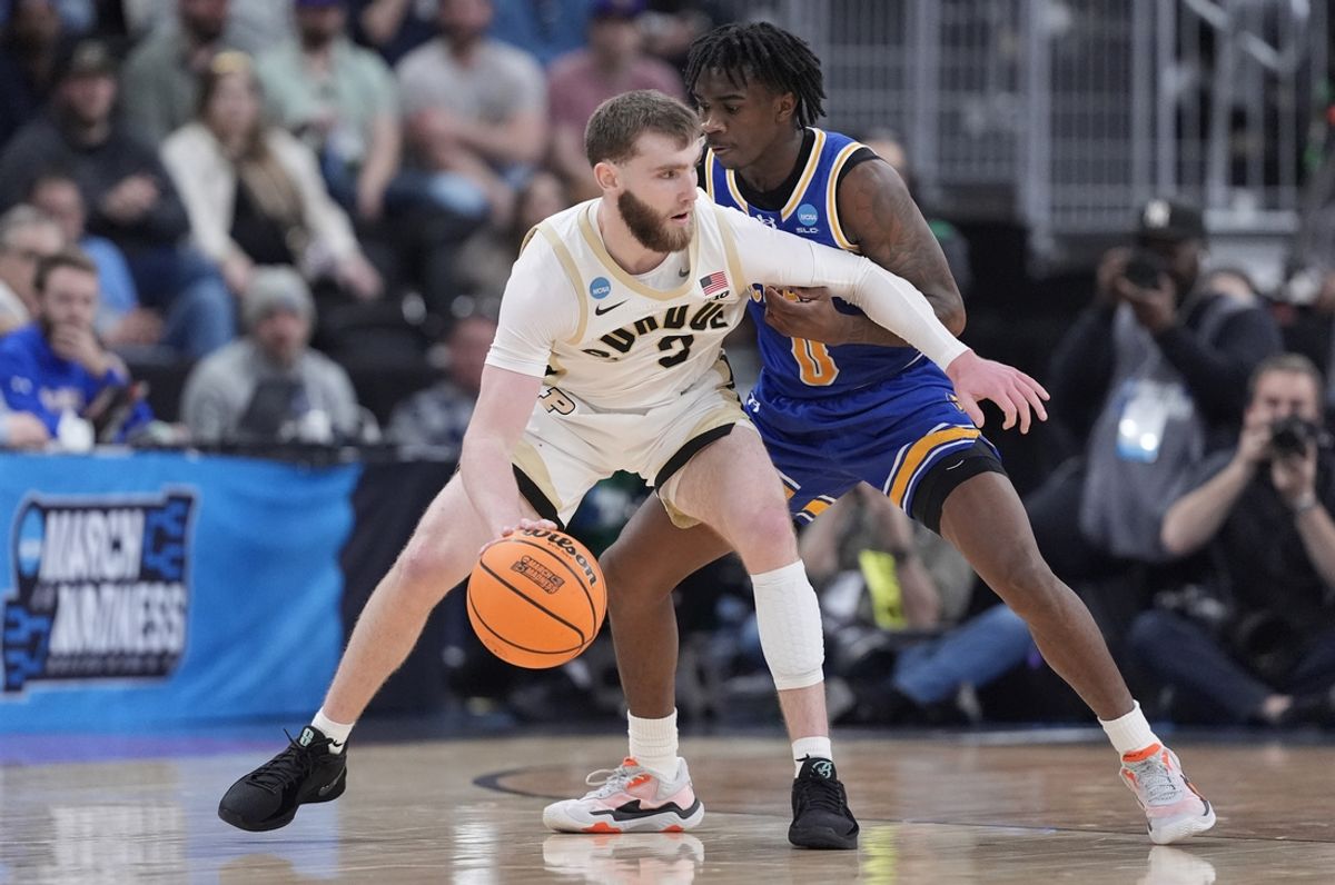 Mar 22, 2025; Providence, RI, USA; Purdue Boilermakers guard Braden Smith (3) dribbles against McNeese State Cowboys guard T'Johnn Brown (0) during the first half of a second round men’s NCAA Tournament game at Amica Mutual Pavilion. Mandatory Credit: Gregory Fisher-Imagn Images