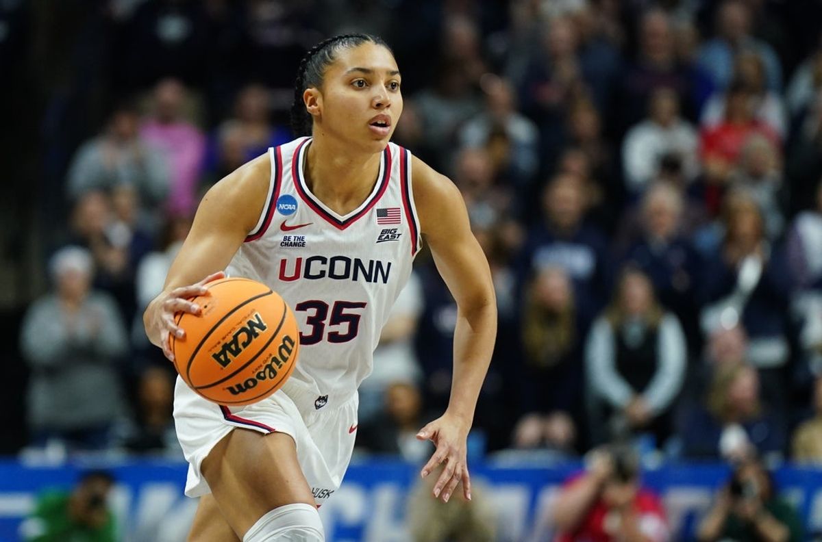 Mar 22, 2025; Storrs, Connecticut, USA; UConn Huskies guard Azzi Fudd (35) drives the ball against the Arkansas State Red Wolves in the first half at Harry A. Gampel Pavilion. Mandatory Credit: David Butler II-Imagn Images