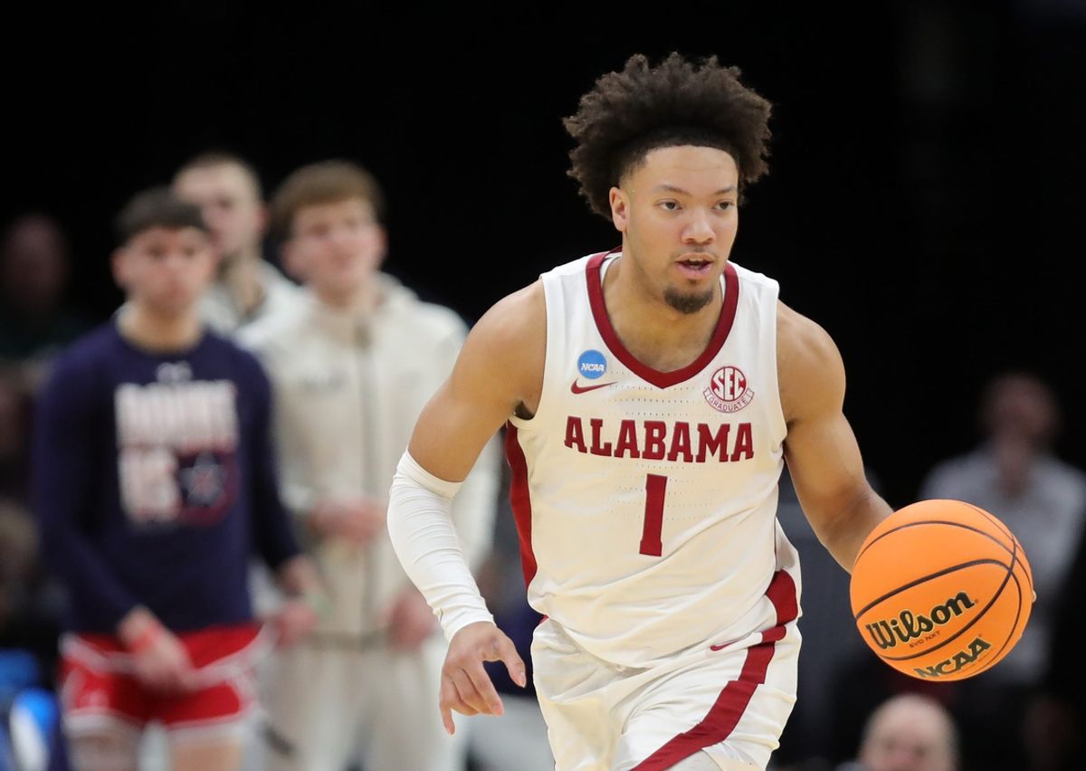 Alabama Crimson Tide guard Mark Sears (1) takes the ball up the court during the second half of an NCAA Tournament First Round game against the Robert Morris Colonials at Rocket Arena on Friday, March 21, 2025, in Cleveland, Ohio.