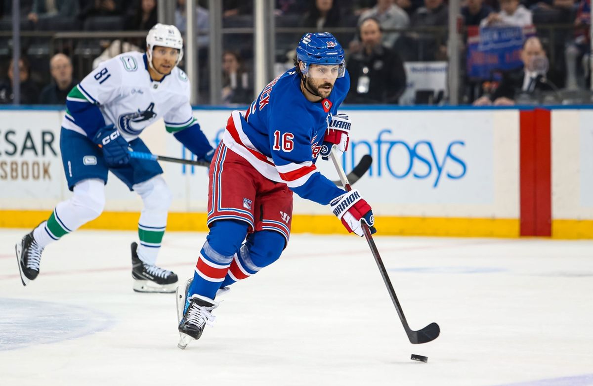 Mar 22, 2025; New York, New York, USA; New York Rangers center Vincent Trocheck (16) skates into the zone against the Vancouver Canucks during the first period at Madison Square Garden. Mandatory Credit: Danny Wild-Imagn Images