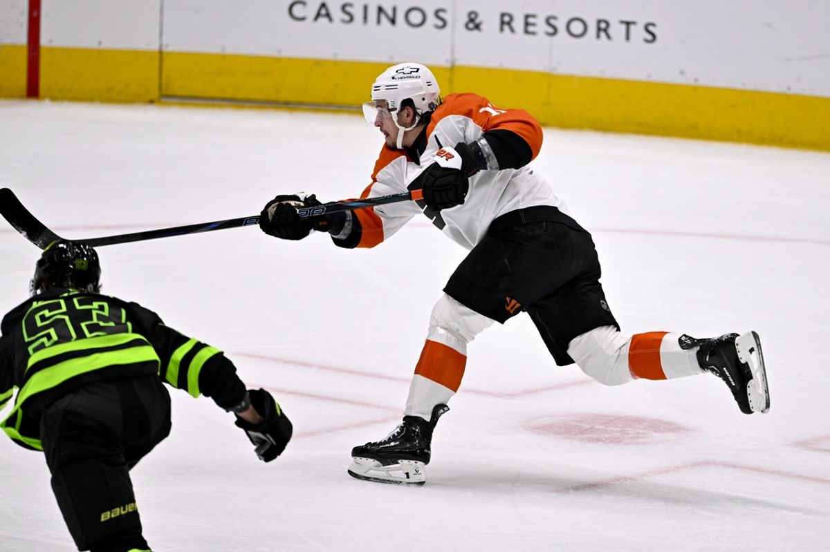 Mar 22, 2025; Dallas, Texas, USA; Philadelphia Flyers right wing Travis Konecny (11) scores a goal against Dallas Stars goaltender Jake Oettinger (not pictured) during the second period at the American Airlines Center. Mandatory Credit: Jerome Miron-Imagn Images