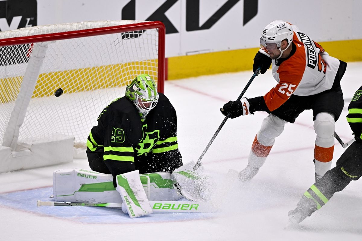 Mar 22, 2025; Dallas, Texas, USA; Philadelphia Flyers center Ryan Poehling (25) scores a goal against Dallas Stars goaltender Jake Oettinger (29) during the second period at the American Airlines Center. Mandatory Credit: Jerome Miron-Imagn Images